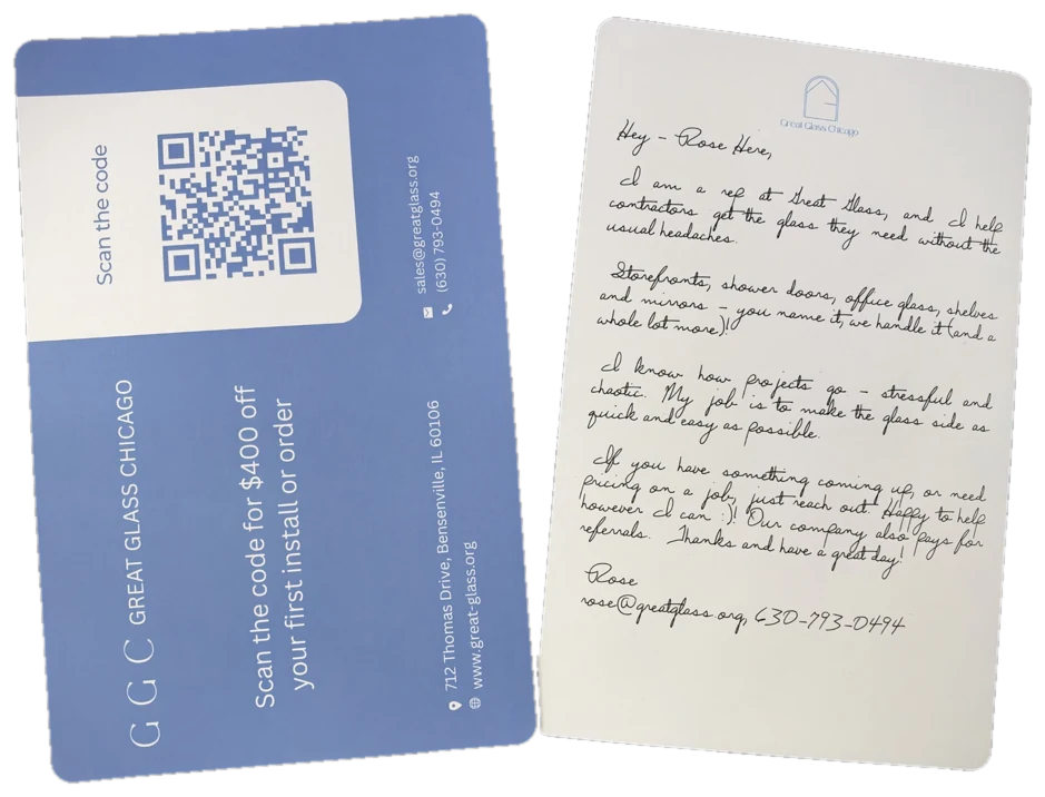 A printed postcard with a QR code next to a postcard with a handwritten message on the back